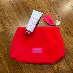 NEW Clarins body lotion and cosmetic bag